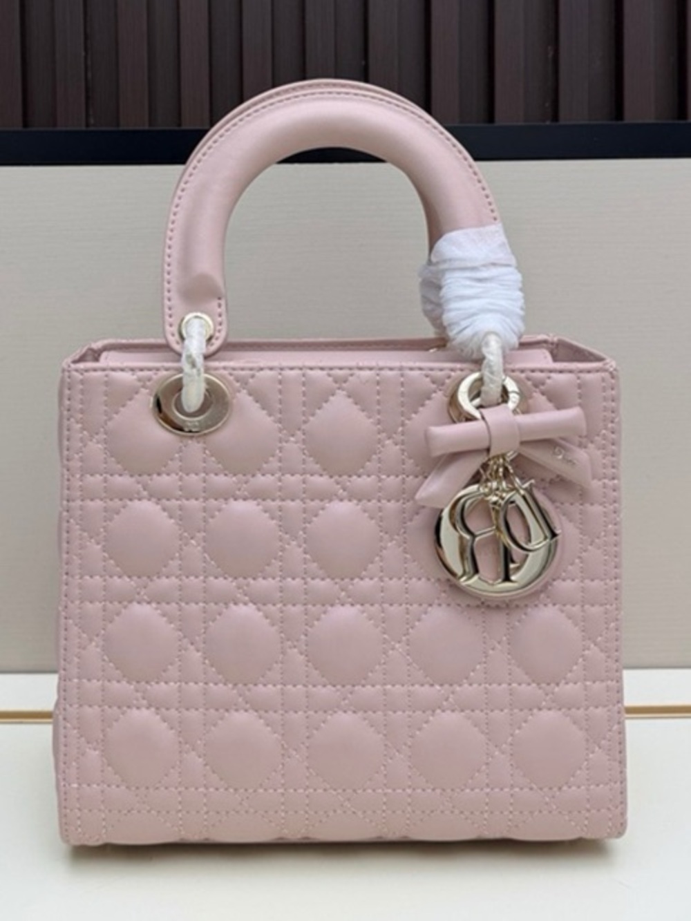 Blush Pink Quilted Top-Handle Handbag with Bow Charm